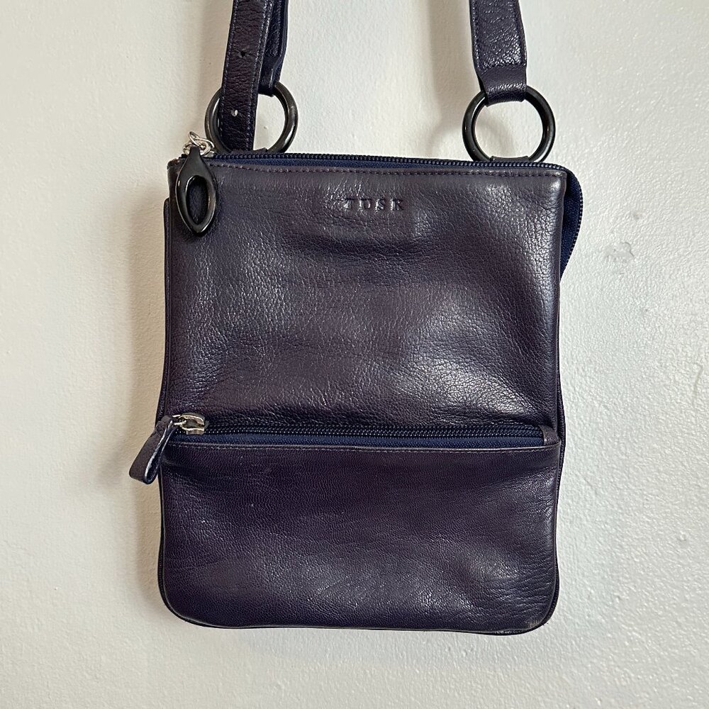 Tusk New York • leather accordion crossbody purse deep purple